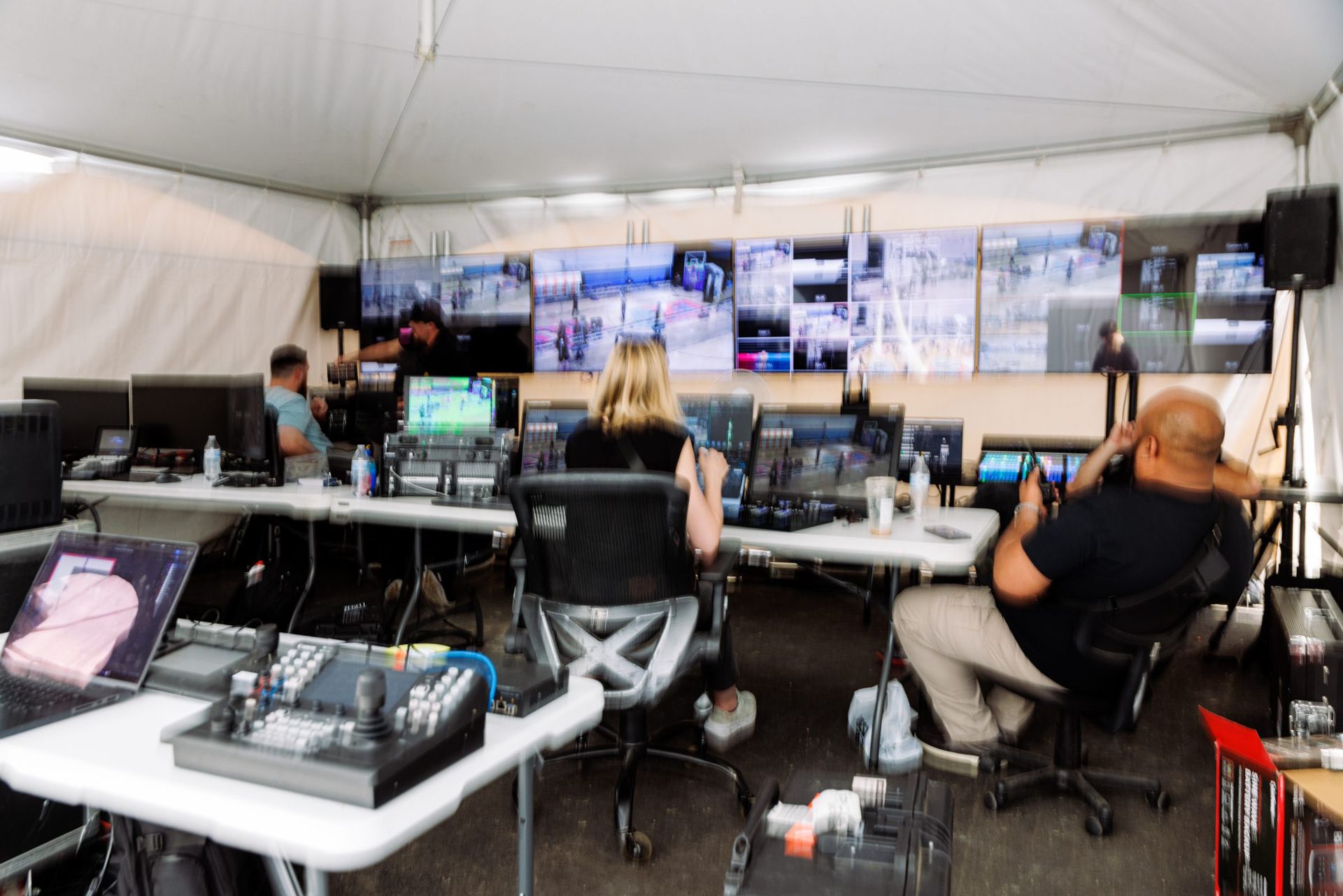 Video village under the tent — director, TD and replay