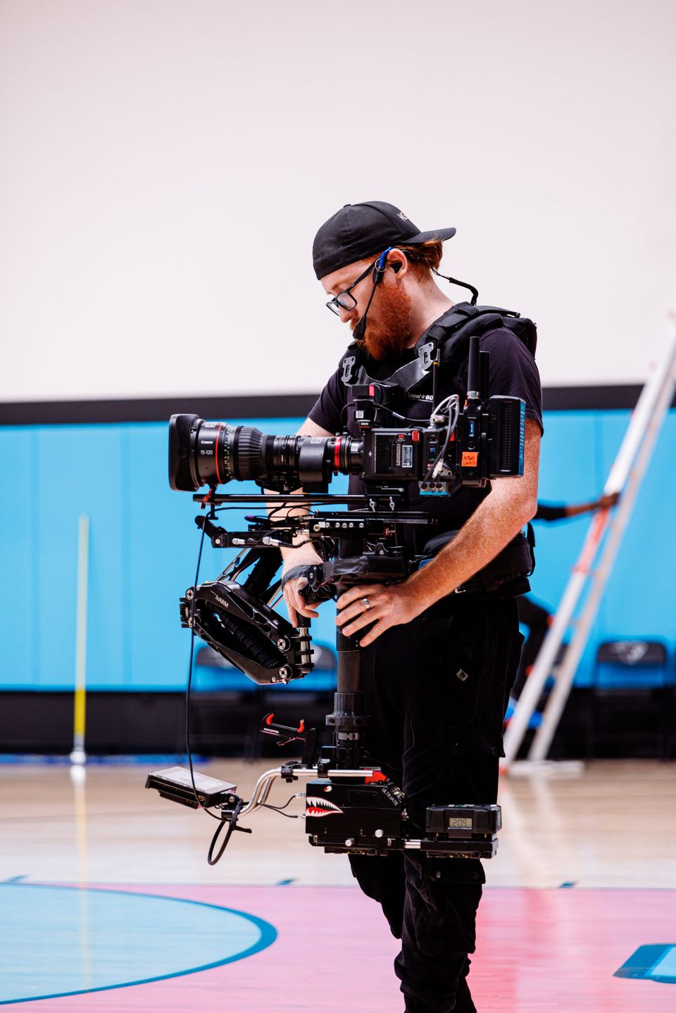 Handheld operator with a RED Komodo-X on Canon Cine-Servo glass