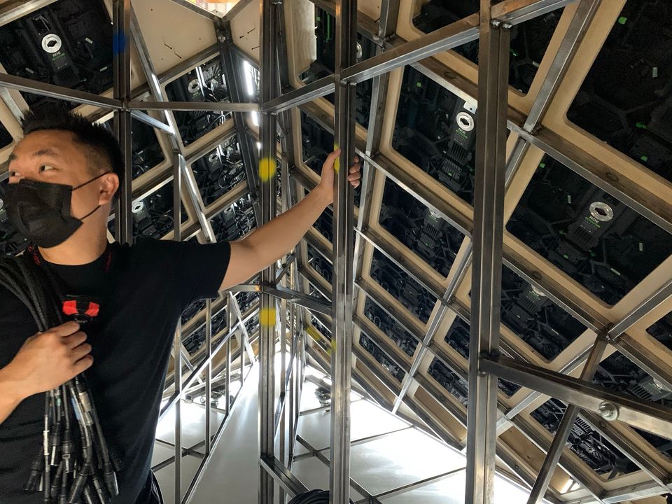 Building the LED faces on the timber frame from inside the pyramid