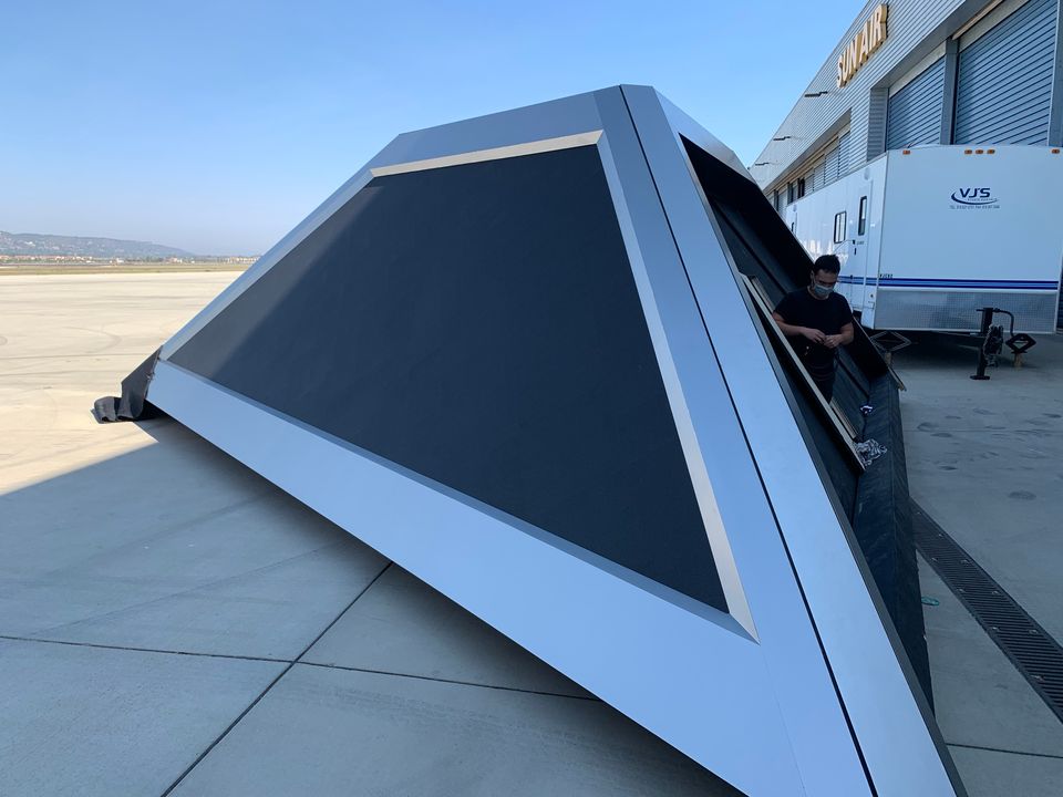 One LED face of the pyramid outside the hangar before load-in