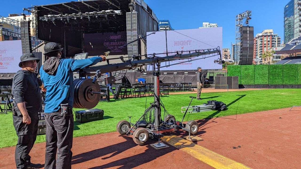 Technocrane on a stadium field during a commercial shoot