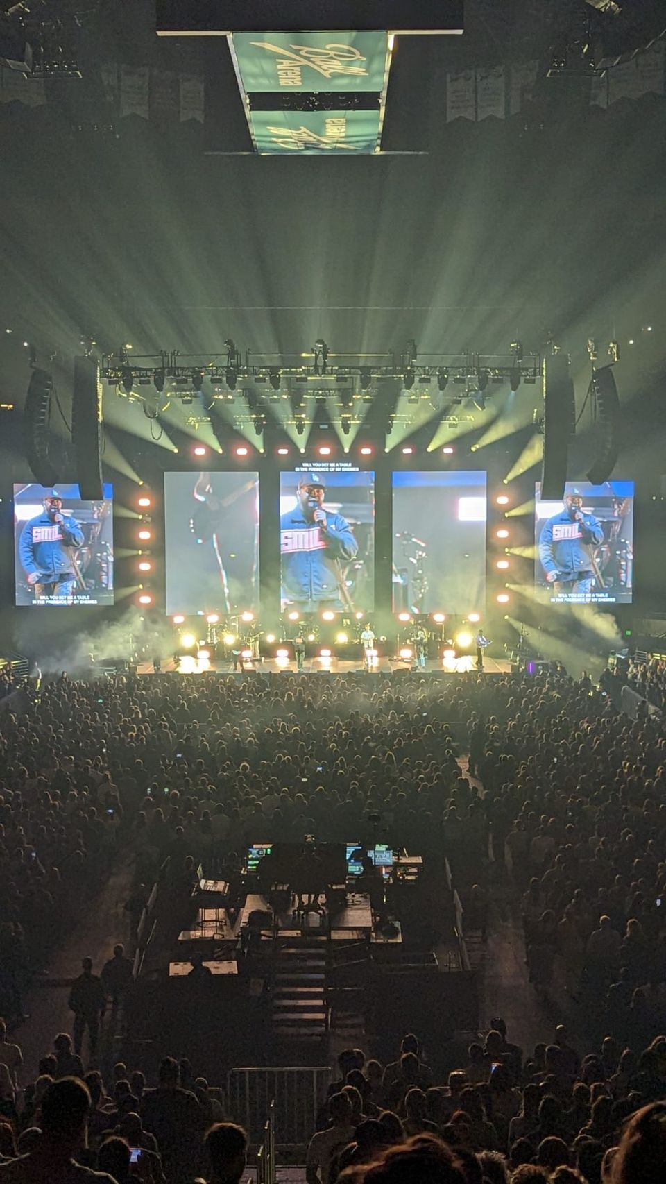 Ball Arena, Denver — five LED panels carrying IMAG and lyrics over the crowd