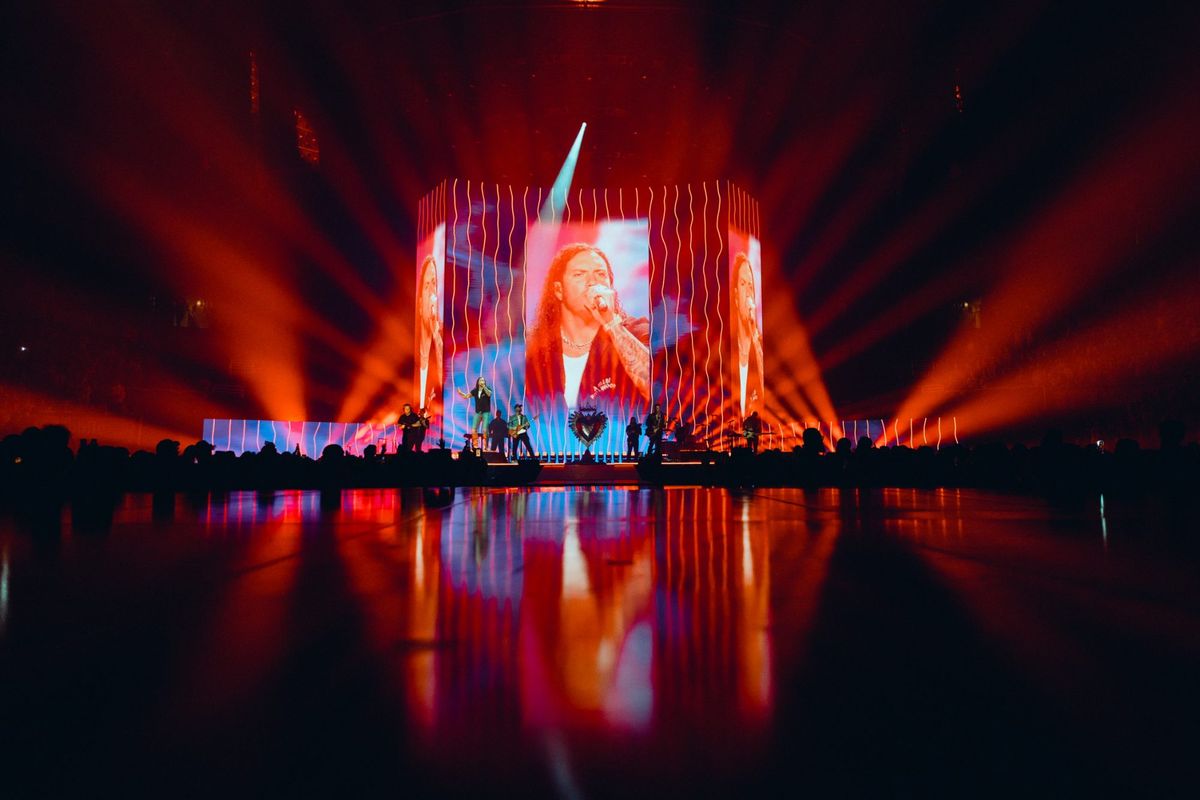 The King of Hearts set with Brandon Lake on IMAG across every LED surface, reflected on the arena floor