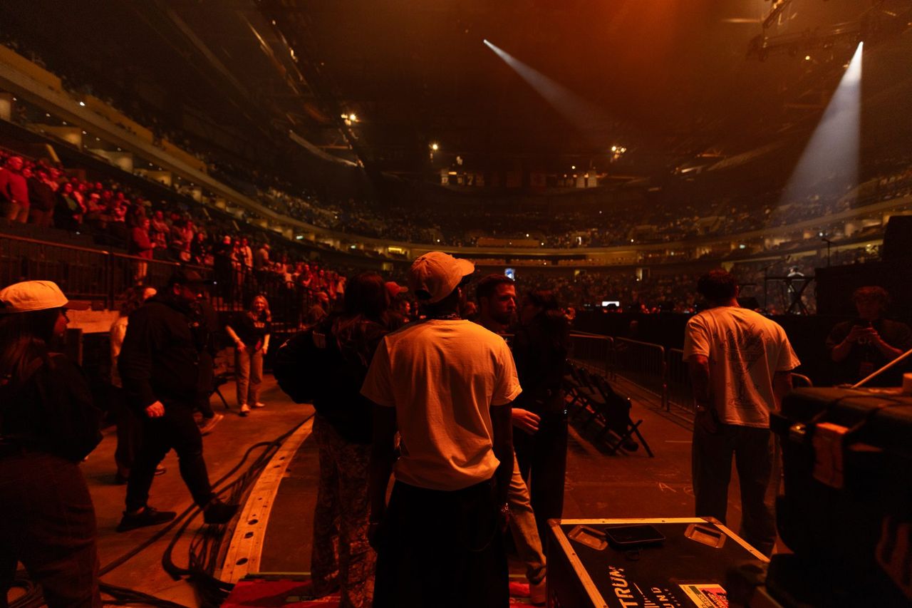 Arena from front of house with IMAG screens flanking the stage